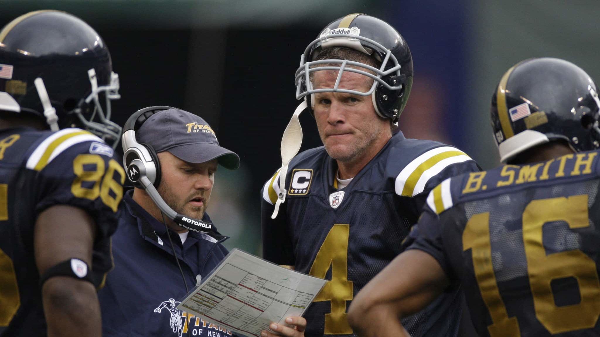 28 September 2008: New York Jets quarterback Brett Favre (4) and quarterbacks coach Brian Daboll during the first half of the Jets 56-35 win over the Cardinals at Giants Stadium in East Rutherford, NJ