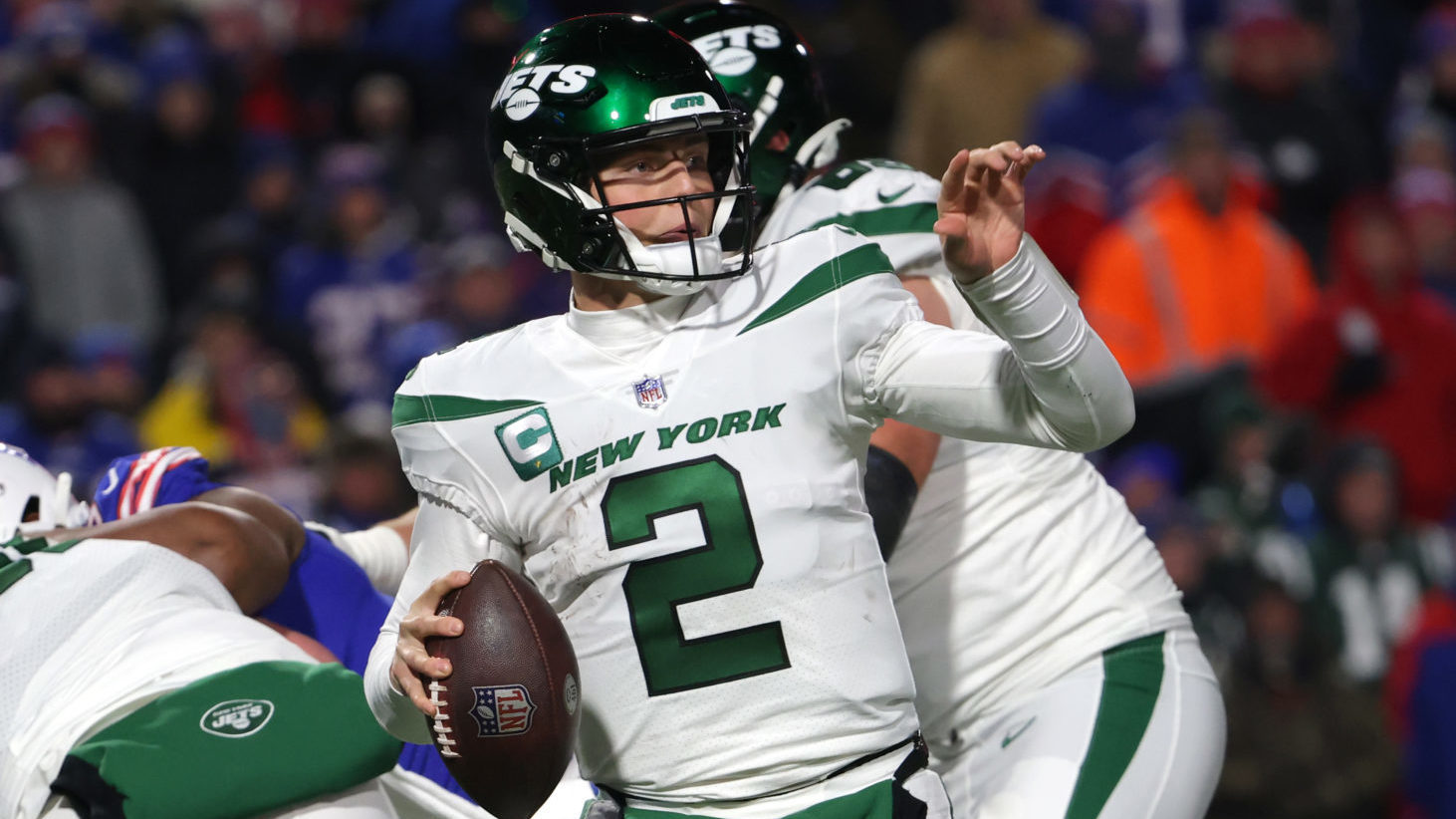 ORCHARD PARK, NY - JANUARY 09: Zach Wilson #2 of the New York Jets drops back to throw a pass against the Buffalo Bills at Highmark Stadium on January 9, 2022 in Orchard Park, New York.