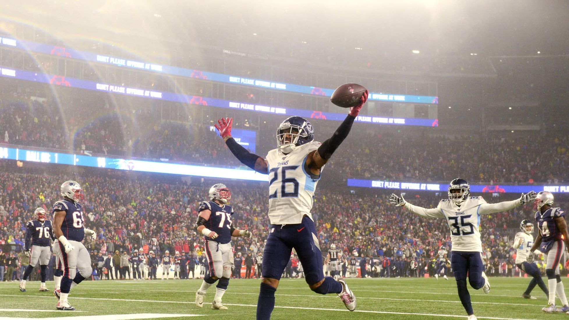 FOXBOROUGH, MASSACHUSETTS - JANUARY 04: Logan Ryan #26 of the Tennessee Titans celebrates his touchdown against the New England Patriots in the fourth quarter of the AFC Wild Card Playoff game at Gillette Stadium on January 04, 2020 in Foxborough, Massachusetts.