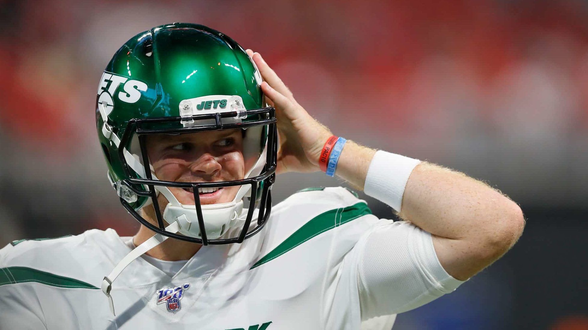 ATLANTA, GEORGIA - AUGUST 15: Sam Darnold #14 of the New York Jets looks on against the Atlanta Falcons during the first half of the preseason game at Mercedes-Benz Stadium on August 15, 2019 in Atlanta, Georgia.