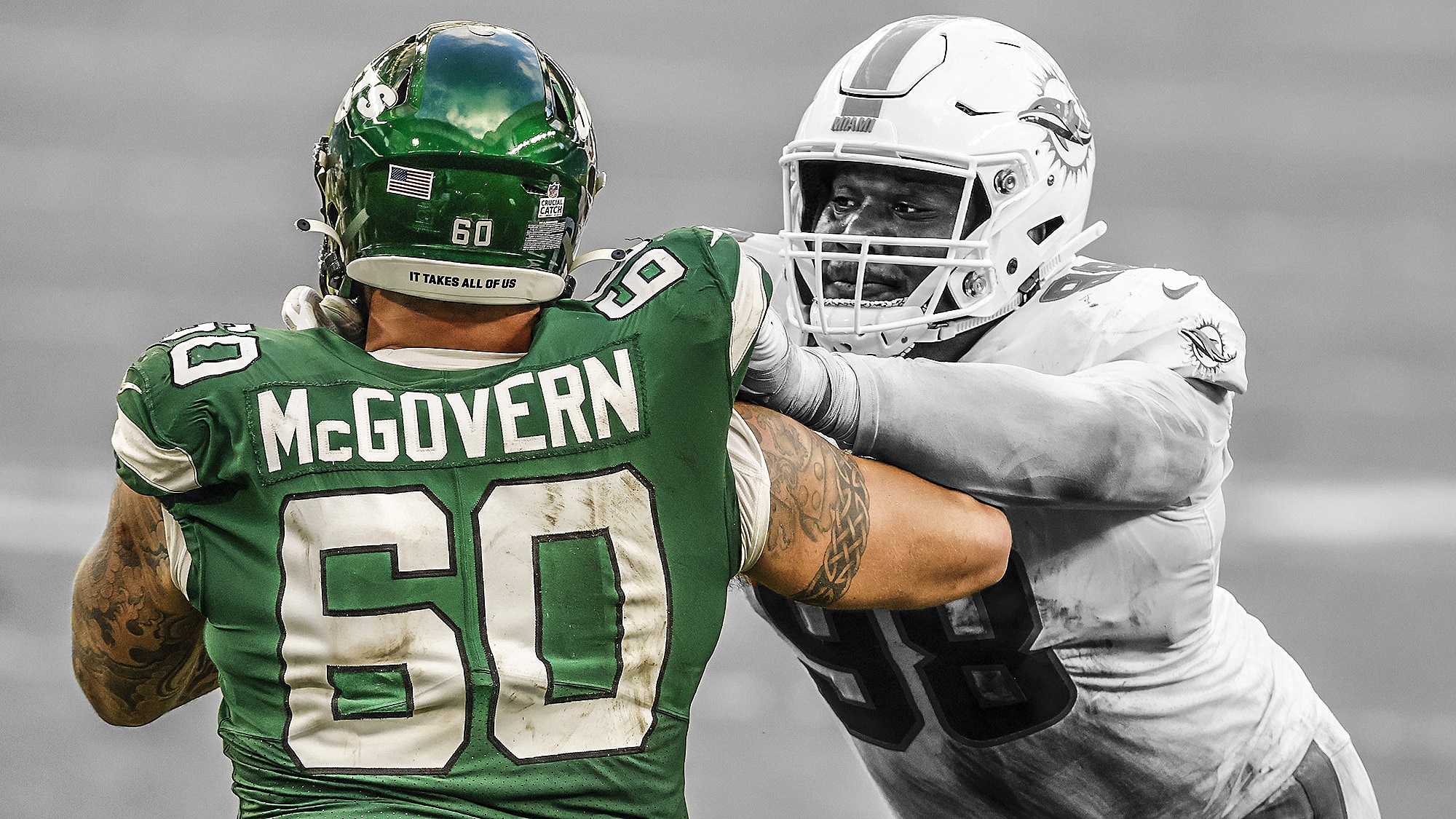 MIAMI GARDENS, FLORIDA - OCTOBER 18: Raekwon Davis #98 of the Miami Dolphins in action against Connor McGovern #60 of the New York Jets at Hard Rock Stadium on October 18, 2020 in Miami Gardens, Florida.
