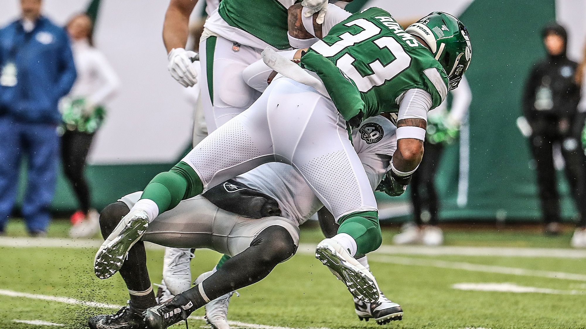 EAST RUTHERFORD, NEW JERSEY - NOVEMBER 24: Jamal Adams #33 of the New York Jets sacks Derek Carr #4 of the Oakland Raiders during their game at MetLife Stadium on November 24, 2019 in East Rutherford, New Jersey.