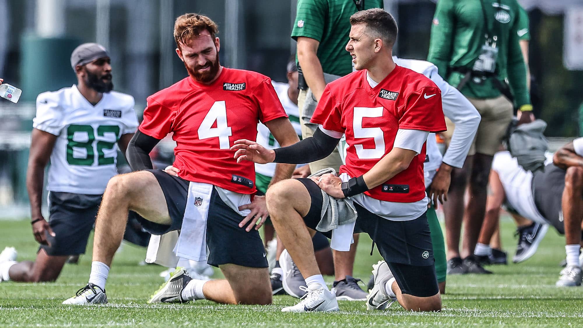 FLORHAM PARK, NJ - JULY 28: Quarterbacks James Morgan #4 and Mike White #5 of the New York Jets during morning practice at Atlantic Health Jets Training Center on July 28, 2021 in Florham Park, New Jersey.