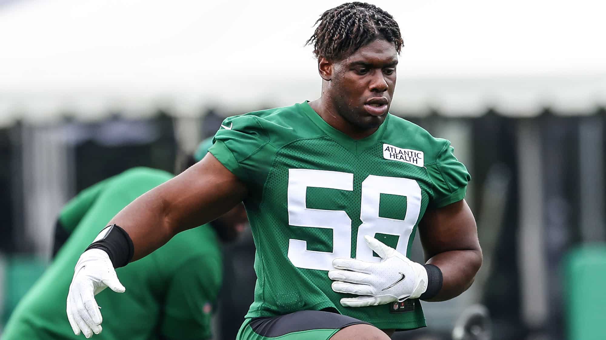 Carl Lawson was carted off with a leg injury at NY Jets practice in Green Bay.
