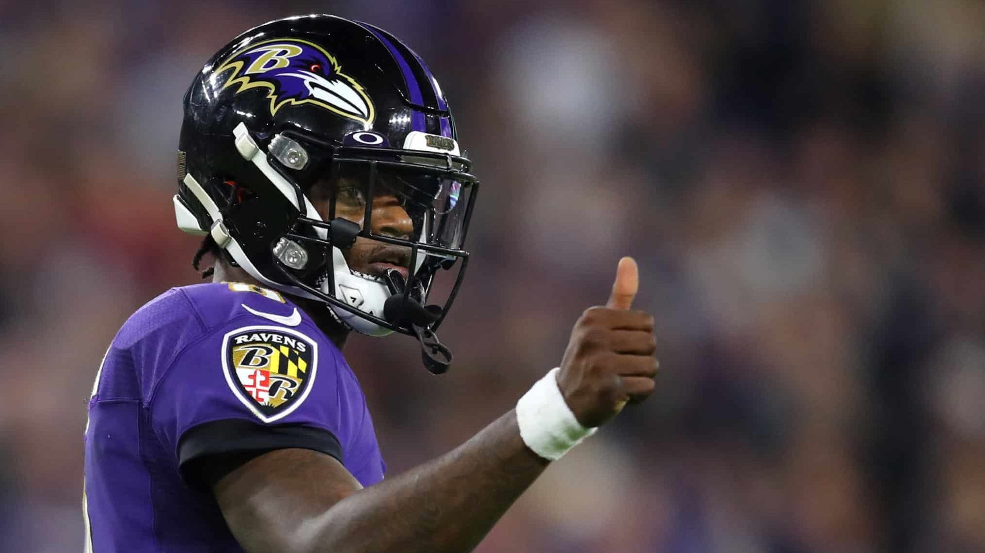 BALTIMORE, MARYLAND - JANUARY 11: Lamar Jackson #8 of the Baltimore Ravens gives a thumbs up during the AFC Divisional Playoff game against the Tennessee Titans at M&T Bank Stadium on January 11, 2020 in Baltimore, Maryland.