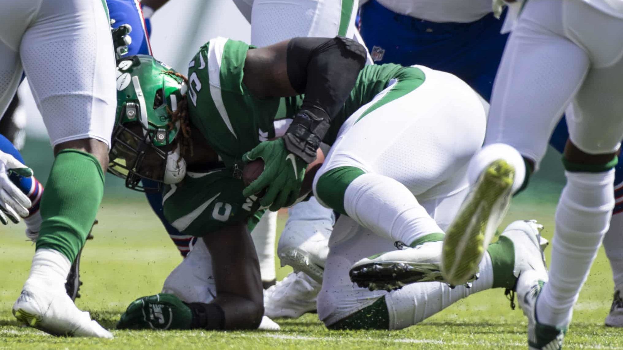EAST RUTHERFORD, NJ - SEPTEMBER 08: C.J. Mosley #57 of the New York Jets picks up a fumbled snap by the Buffalo Bills during the second quarter at MetLife Stadium on September 8, 2019 in East Rutherford, New Jersey.
