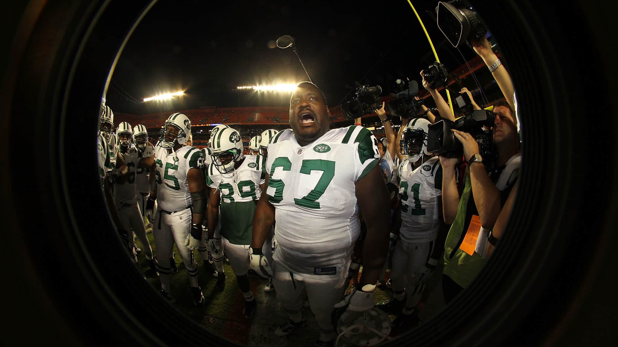 MIAMI - SEPTEMBER 26: Tackle Damein Woody #67 of the New York Jets fires up the team against the Miami Dolphins on September 26, 2010 in Miami, Florida. Jets beat the Dolphins 31-23.