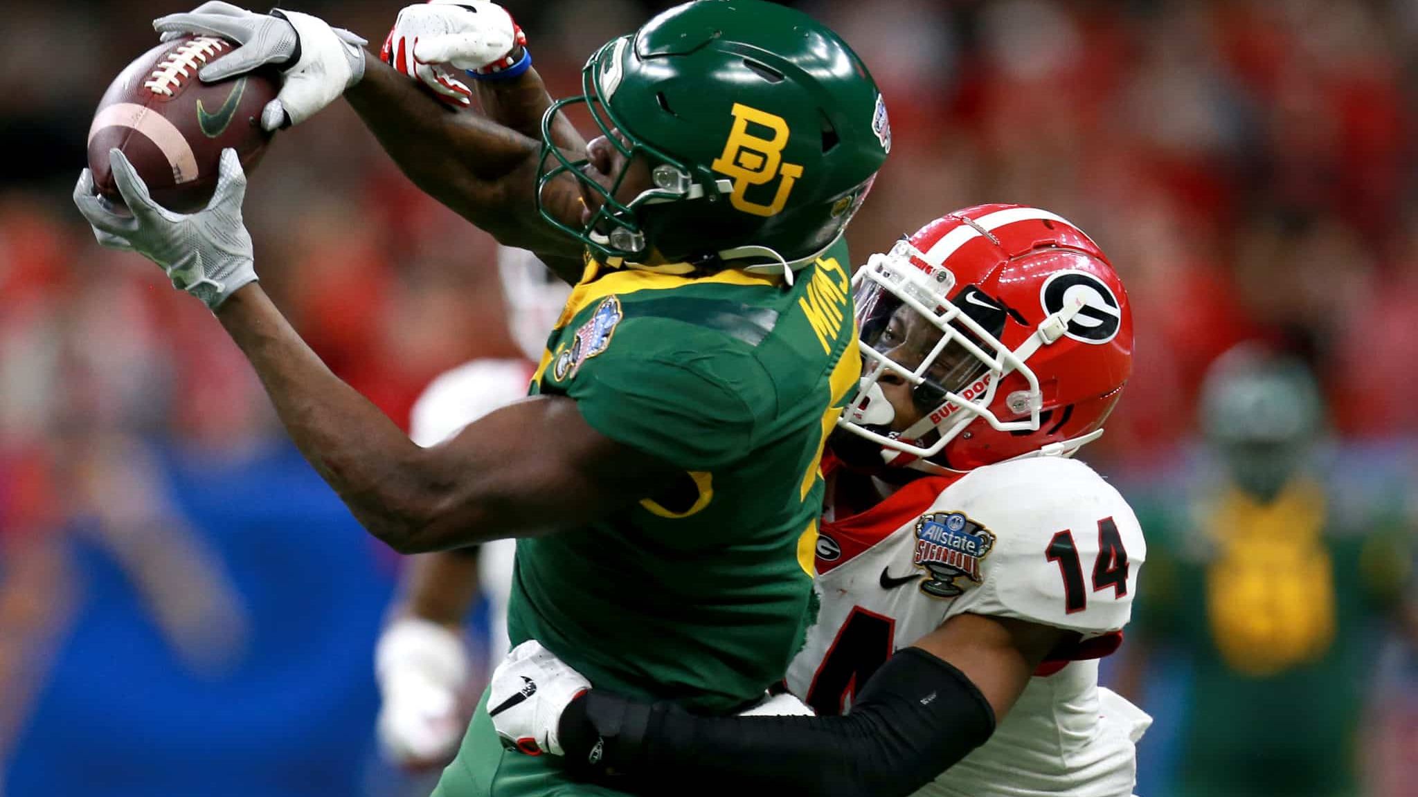 NEW ORLEANS, LOUISIANA - JANUARY 01: Denzel Mims #5 of the Baylor Bears catches a pass over DJ Daniel #14 of the Georgia Bulldogs during the Allstate Sugar Bowl at Mercedes Benz Superdome on January 01, 2020 in New Orleans, Louisiana.
