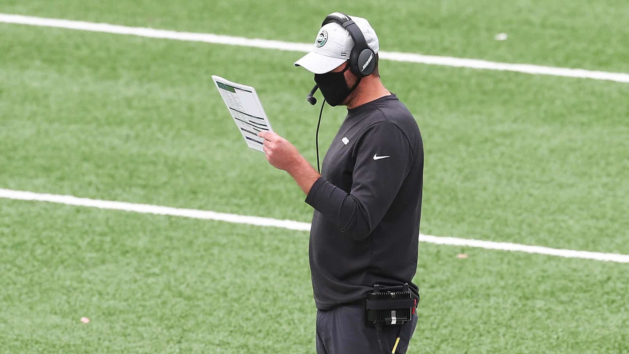 EAST RUTHERFORD, NEW JERSEY - OCTOBER 11: head coach Adam Gase of the New York Jets looks on from the sideline during the game against the Arizona Cardinals at MetLife Stadium on October 11, 2020 in East Rutherford, New Jersey. Arizona Cardinals defeated the New York Jets 30-10.