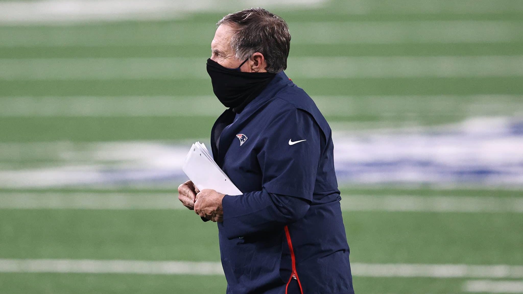 EAST RUTHERFORD, NEW JERSEY - NOVEMBER 09: Head coach Bill Belichick of the New England Patriots walks off the field at halftime against the New York Jets at MetLife Stadium on November 09, 2020 in East Rutherford, New Jersey.