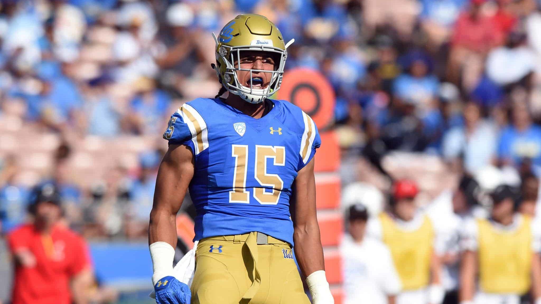 PASADENA, CA - SEPTEMBER 01: UCLA (15) Jaelan Phillips (LB) celebrates after making a sack during an college football game between the Cincinnati Bearcats and the UCLA Bruins on September 01, 2018, at the Rose Bowl in Pasadena, CA.