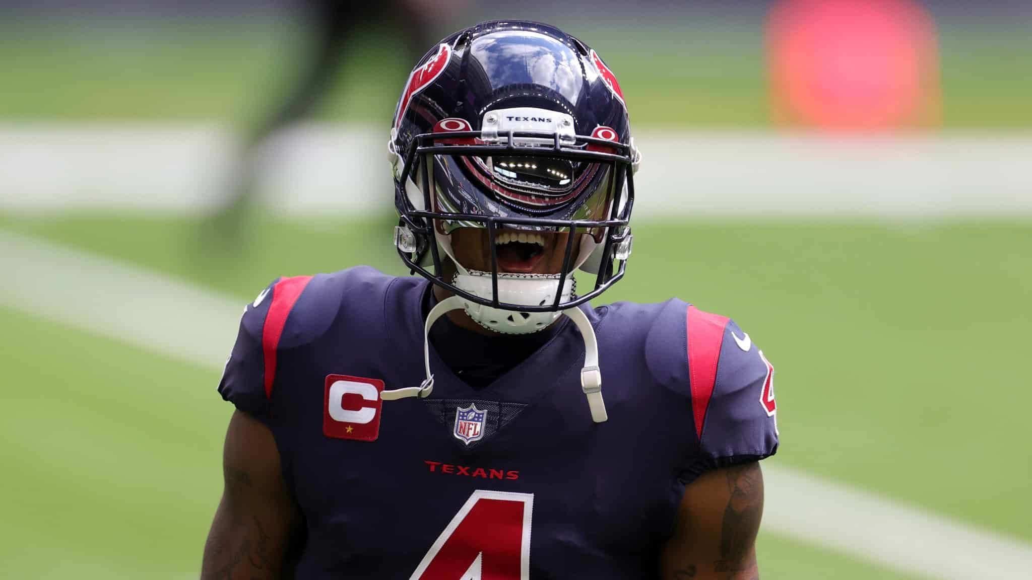 HOUSTON, TEXAS - DECEMBER 27: Quarterback Deshaun Watson #4 of the Houston Texans warms up prior to the game against the Cincinnati Bengals at NRG Stadium on December 27, 2020 in Houston, Texas.