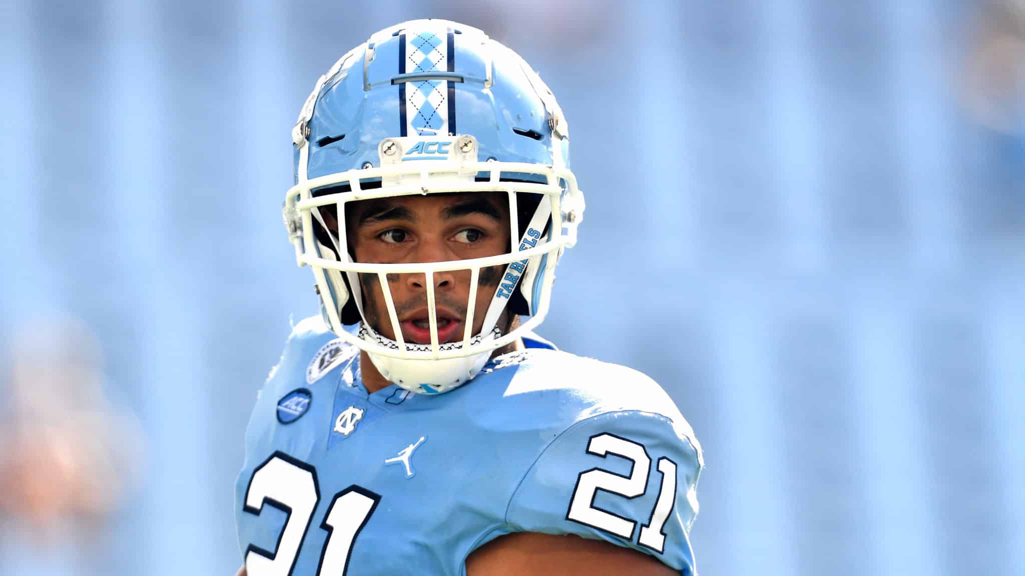 CHAPEL HILL, NORTH CAROLINA - OCTOBER 24: Chazz Surratt #21 of the North Carolina Tar Heels surveys the field during their game against the North Carolina State Wolfpack at Kenan Stadium on October 24, 2020 in Chapel Hill, North Carolina. The Tar Heels won 48-21.