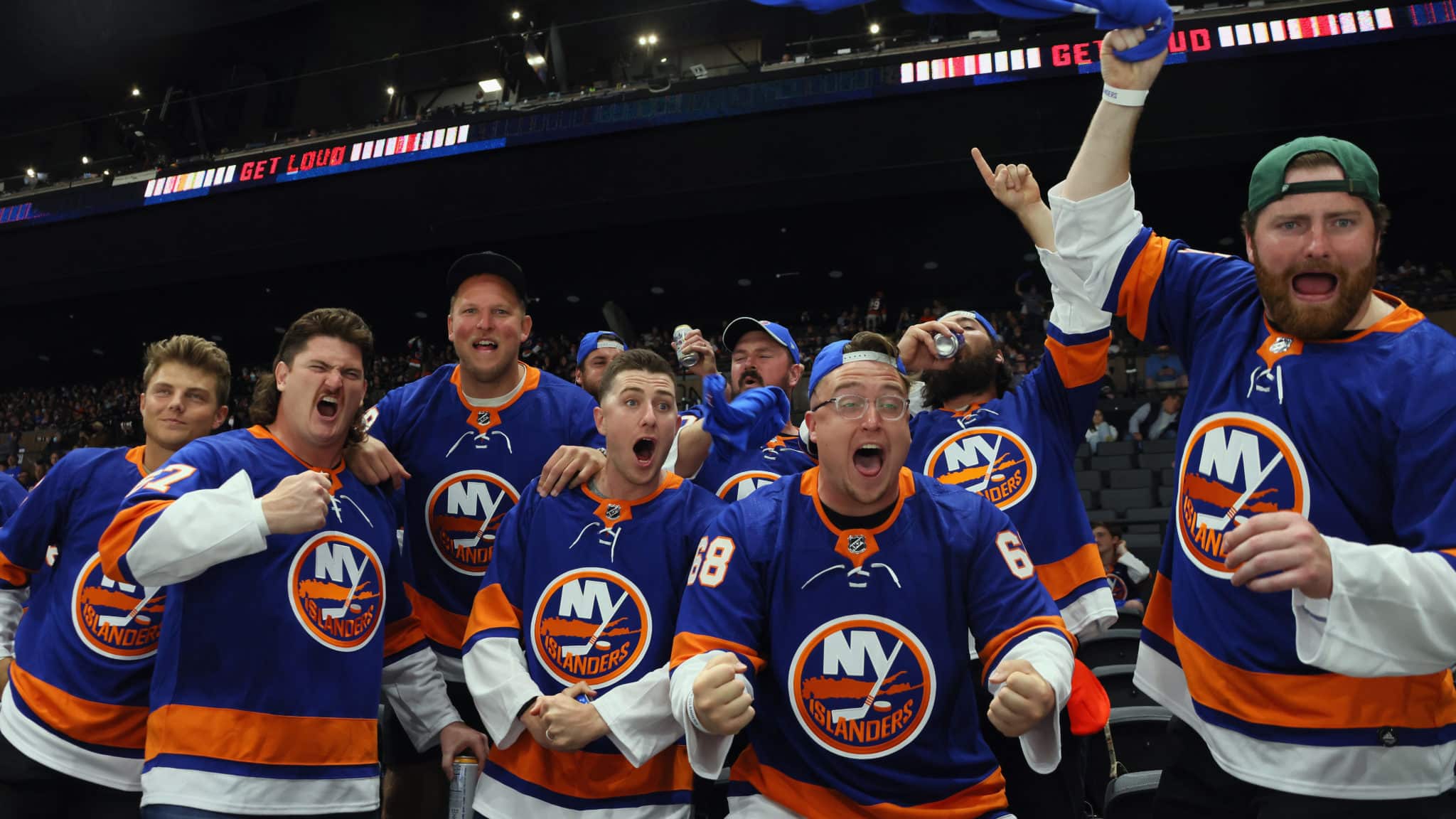 UNIONDALE, NEW YORK - MAY 22: Members of the New York Jets football team including Zach Wilson (L) attend the New York Islanders game against the Pittsburgh Penguins in Game Four of the First Round of the 2021 Stanley Cup Playoffs at the Nassau Coliseum on May 22, 2021 in Uniondale, New York.