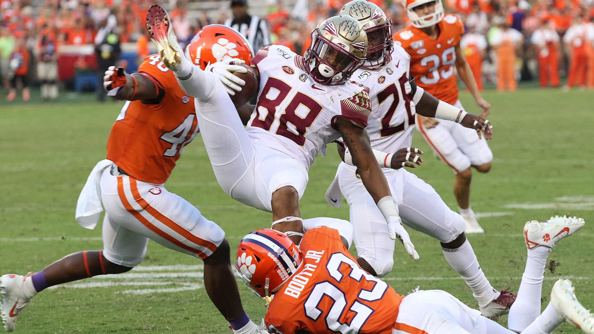 CLEMSON, SC - OCTOBER 12: Ryan Fitzgerald (88) of Florida State is up ended by Andrew Booth Jr. (23) defensive back of Clemson on a kick return during a college football game between Florida State Seminoles and the Clemson Tigers on October 12, 2019, at Clemson Memorial Stadium in Clemson, SC.