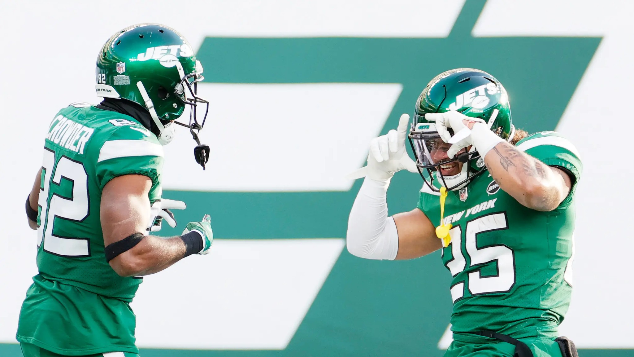 EAST RUTHERFORD, NEW JERSEY - DECEMBER 27: Jamison Crowder #82 celebrates his touchdown with teammate Ty Johnson #25 of the New York Jets in the third quarter against the Cleveland Browns at MetLife Stadium on December 27, 2020 in East Rutherford, New Jersey.