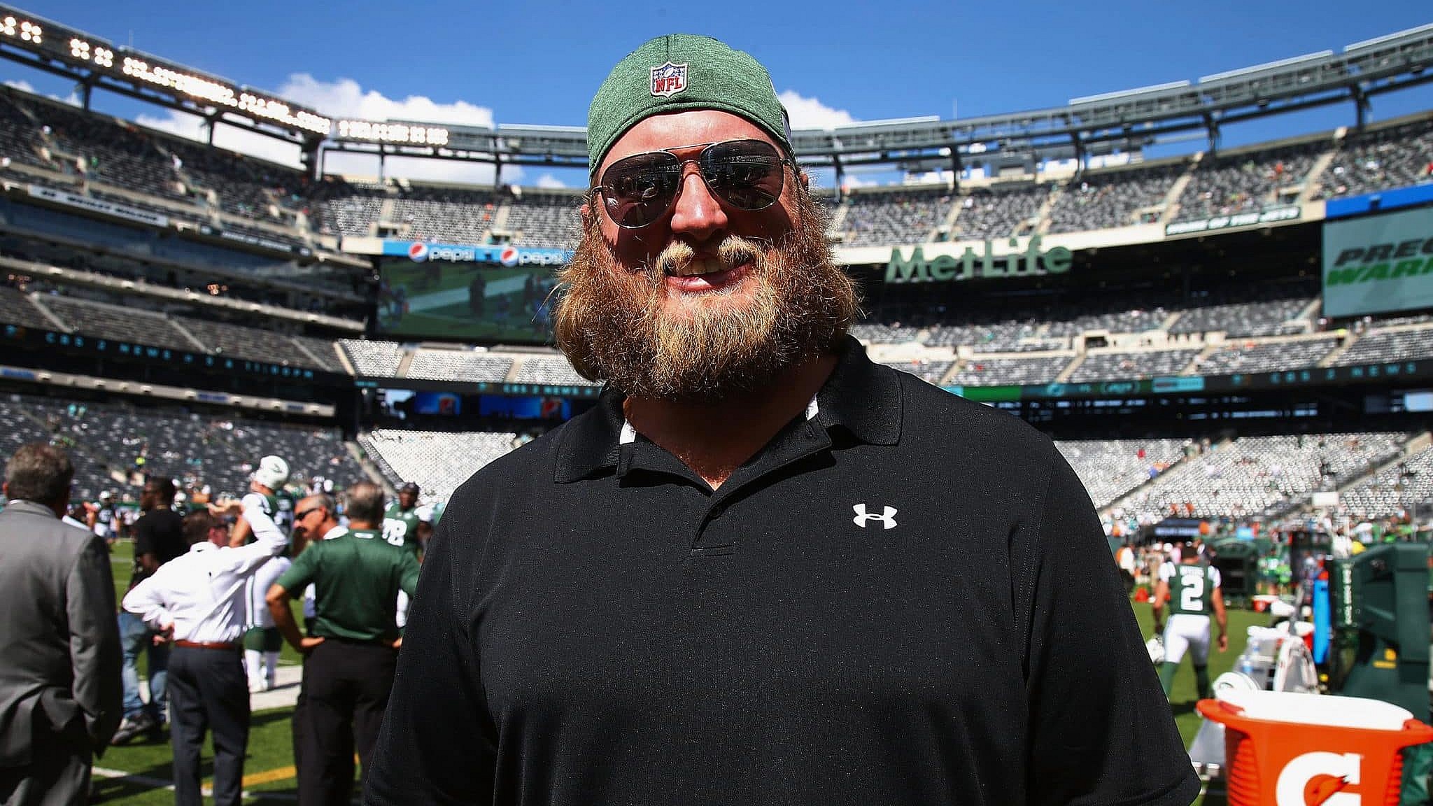 EAST RUTHERFORD, NJ - SEPTEMBER 16: Former New York Jets star Nick Mangold attends the Miami Dolphins vs New York Jets game at MetLife Stadium on September 16, 2018 in East Rutherford, New Jersey.