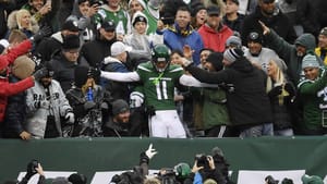 EAST RUTHERFORD, NEW JERSEY - NOVEMBER 24: Wide receiver Robby Anderson #11 of the New York Jets jumps into the stands after scoring a touchdown during the second half of the game against the Oakland Raiders at MetLife Stadium on November 24, 2019 in East Rutherford, New Jersey.