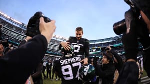 EAST RUTHERFORD, NEW JERSEY - DECEMBER 08: Nathan Shepherd #97 of the New York Jets lifts up Sam Ficken #9 after Ficken's game-winning field goal during the second half of the game against the Miami Dolphins at MetLife Stadium on December 08, 2019 in East Rutherford, New Jersey. The New York Jets defeat the Miami Dolphins 22-21.