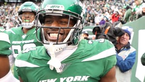 EAST RUTHERFORD, NEW JERSEY - NOVEMBER 24: Brian Poole #34 of the New York Jets celebrates his third quarter interception return for a touchdown against the Oakland Raiders during their game at MetLife Stadium on November 24, 2019 in East Rutherford, New Jersey.