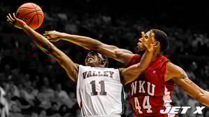 DAYTON, OH - MARCH 13: Brent Arrington #11 of the Mississippi Valley State Delta Devils goes up for a shot against George Fant #44 of the Western Kentucky Hilltoppers in the second half in the first round of the 2011 NCAA men's basketball tournament at UD Arena on March 13, 2012 in Dayton, Ohio.