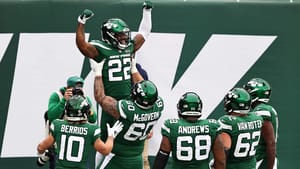 EAST RUTHERFORD, NEW JERSEY - OCTOBER 25: La'Mical Perine #22 of the New York Jets celebrates his touchdown with teammates in the second quarter against the Buffalo Bills at MetLife Stadium on October 25, 2020 in East Rutherford, New Jersey.