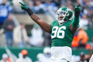 Leonard Taylor III celebrates during the New York Jets' 2024 regular season game against the Indianapolis Colts