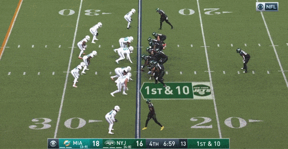 Sam Darnold makes a throw under heavy duress and Robby Anderson makes a tough grab