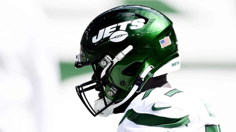 EAST RUTHERFORD, NEW JERSEY - SEPTEMBER 20: Mekhi Becton #77 of the New York Jets looks on during warmups before the game against the San Francisco 49ers at MetLife Stadium on September 20, 2020 in East Rutherford, New Jersey.