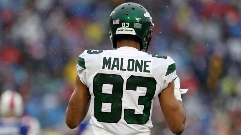 ORCHARD PARK, NEW YORK - DECEMBER 29: Josh Malone #83 of the New York Jets runs onto the field during the first quarter of an NFL game against the Buffalo Bills at New Era Field on December 29, 2019 in Orchard Park, New York.