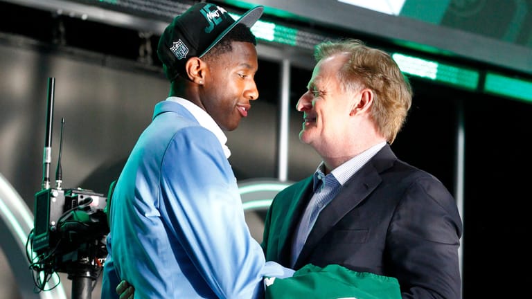 LAS VEGAS, NV - APRIL 28: Sauce Gardner, Cincinnati, speaks with NFL commissioner Roger Goodell after being selected as the number four overall draft pick by the New York Jets during the NFL Draft on April 28, 2022 in Las Vegas, Nevada.