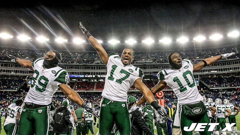 FOXBORO, MA - JANUARY 16: Jerricho Cotchery #89, Braylon Edwards #17 and Santonio Holmes #10 of the New York Jets celebrate their 28 to 21 victory over the New England Patriots during their 2011 AFC divisional playoff game at Gillette Stadium on January 16, 2011 in Foxboro, Massachusetts.