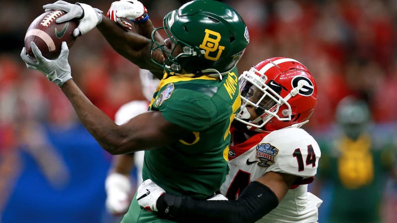 NEW ORLEANS, LOUISIANA - JANUARY 01: Denzel Mims #5 of the Baylor Bears catches a pass over DJ Daniel #14 of the Georgia Bulldogs during the Allstate Sugar Bowl at Mercedes Benz Superdome on January 01, 2020 in New Orleans, Louisiana.