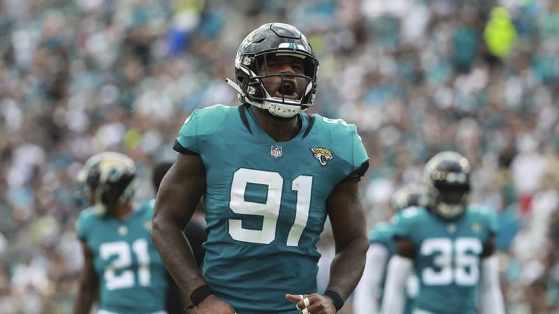 JACKSONVILLE, FL - SEPTEMBER 16: Yannick Ngakoue #91 of the Jacksonville Jaguars celebrates a play in the first half against the New England Patriots at TIAA Bank Field on September 16, 2018 in Jacksonville, Florida.
