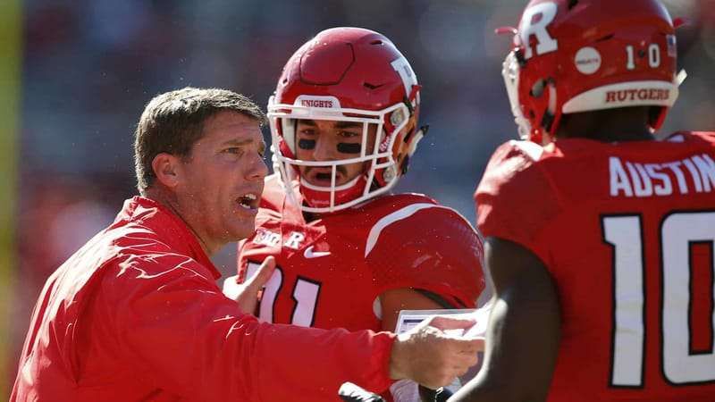 PISCATAWAY, NJ - OCTOBER 15: Rutgers head coach Chris Ash talks to Anthony Cioffi #31 and Blessuan Austin #10 during the third quarter against Illinois during a game on October 15, 2016 in Piscataway, New Jersey. Illinois defeated Rutgers 24-7.