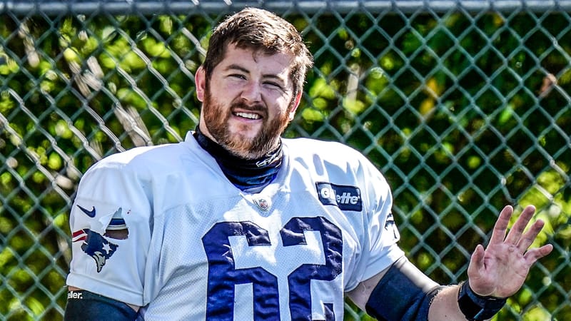 FOXBOROUGH, MASSACHUSETTS - AUGUST 18: Joe Thuney #62 of the New England Patriots waves during training camp at Gillette Stadium on August 18, 2020 in Foxborough, Massachusetts.