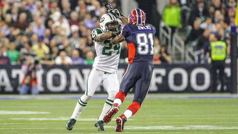 Darrelle Revis jams Terrell Owens in the NY Jets' 2009 win over the Buffalo Bills in Toronto.