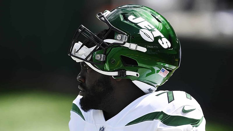 EAST RUTHERFORD, NEW JERSEY - SEPTEMBER 20: Mekhi Becton #77 of the New York Jets looks on during warmups before the game against the San Francisco 49ers at MetLife Stadium on September 20, 2020 in East Rutherford, New Jersey.