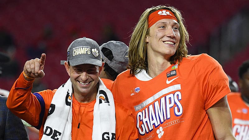 GLENDALE, AZ - DECEMBER 28: Clemson Tigers head coach Dabo Swinney and Clemson Tigers quarterback Trevor Lawrence (16) celebrate after the 2019 PlayStation Fiesta Bowl college football playoff semifinal game between the Ohio State Buckeyes and the Clemson Tigers on December 28, 2019 at State Farm Stadium in Glendale, AZ.