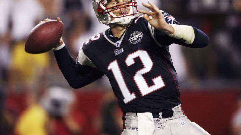 FOXBORO, MA - SEPTEMBER 9: Tom Brady #12 of the New England Patriots throws a pass against the Indianapolis Colts during the NFL game at Gillette Stadium on September 9, 2004 in Foxboro, Massachusetts.