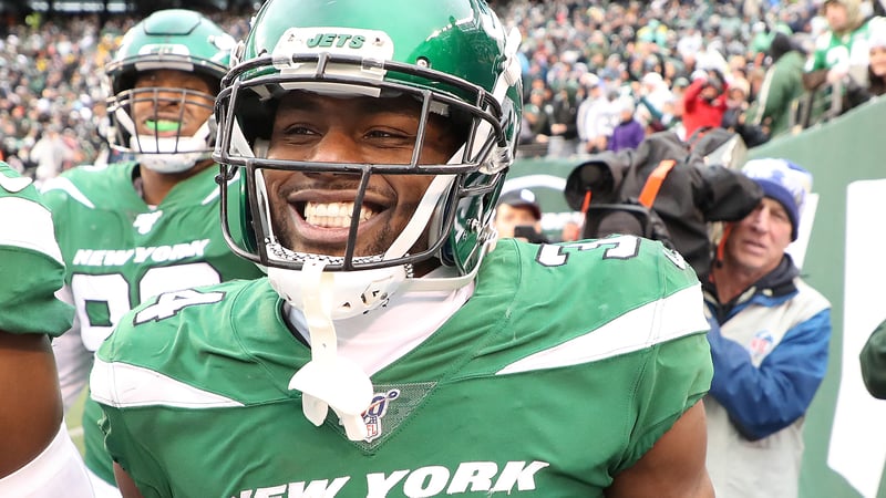 EAST RUTHERFORD, NEW JERSEY - NOVEMBER 24: Brian Poole #34 of the New York Jets celebrates his third quarter interception return for a touchdown against the Oakland Raiders during their game at MetLife Stadium on November 24, 2019 in East Rutherford, New Jersey.