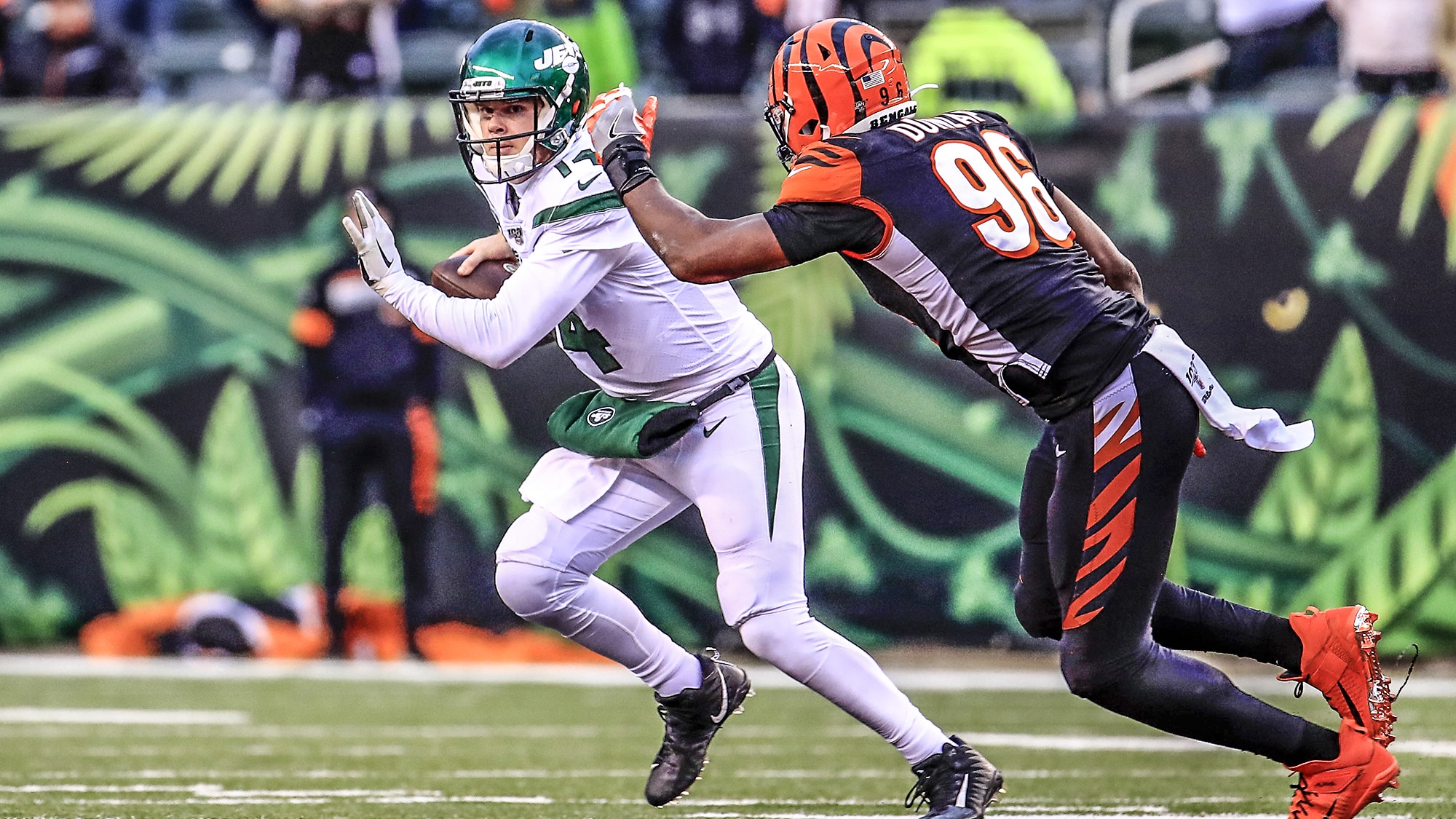 CINCINNATI, OHIO - DECEMBER 01: Sam Darnold #14 of the New York Jets runs with the ball during the game against the Cincinnati Bengals at Paul Brown Stadium on December 01, 2019 in Cincinnati, Ohio.