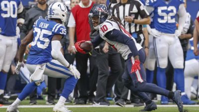 INDIANAPOLIS, IN - OCTOBER 20: DeAndre Hopkins #10 of the Houston Texans runs the ball after a reception as Pierre Desir #35 of the Indianapolis Colts pursues during the second half at Lucas Oil Stadium on October 20, 2019 in Indianapolis, Indiana.