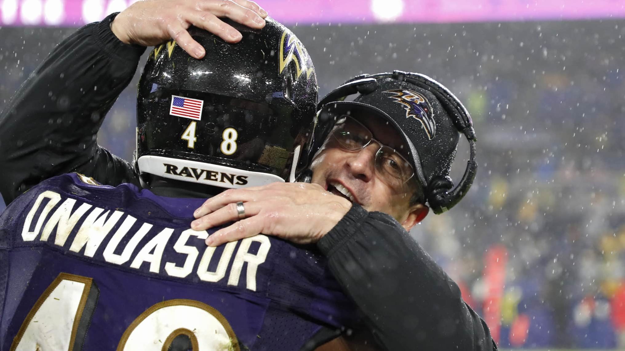 BALTIMORE, MARYLAND - DECEMBER 29: Head coach John Harbaugh of the Baltimore Ravens celebrates with inside linebacker Patrick Onwuasor #48 of the Baltimore Ravens against the Pittsburgh Steelers during the fourth quarter at M&T Bank Stadium on December 29, 2019 in Baltimore, Maryland.