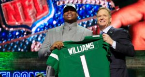 NASHVILLE, TENNESSEE - APRIL 25: Quinnen Williams of Alabama poses with NFL Commissioner Roger Goodell after he was picked #3 overall by the New York Jets during the first round of the 2019 NFL Draft on April 25, 2019 in Nashville, Tennessee.