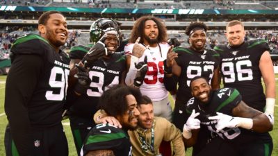 EAST RUTHERFORD, NEW JERSEY - NOVEMBER 10: Leonard Williams #99 of the New York Giants poses with his former teammates of the New York Jets following their game at MetLife Stadium on November 10, 2019 in East Rutherford, New Jersey.