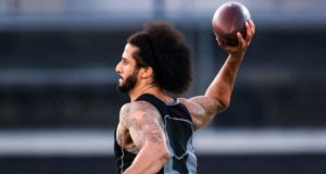 RIVERDALE, GA - NOVEMBER 16: Colin Kaepernick looks to pass during his NFL workout held at Charles R Drew high school on November 16, 2019 in Riverdale, Georgia.