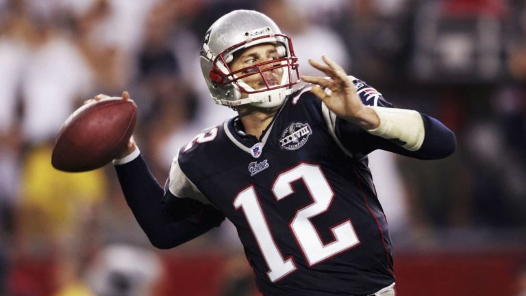 FOXBORO, MA - SEPTEMBER 9: Tom Brady #12 of the New England Patriots throws a pass against the Indianapolis Colts during the NFL game at Gillette Stadium on September 9, 2004 in Foxboro, Massachusetts.