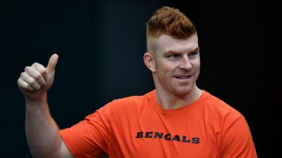 MIAMI, FLORIDA - DECEMBER 22: Andy Dalton #14 of the Cincinnati Bengals gestures to the fans prior to the game against the Miami Dolphins at Hard Rock Stadium on December 22, 2019 in Miami, Florida.
