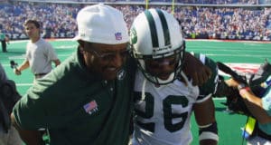 ORCHARD PARK, NY - SEPTEMBER 8: Running back Chad Morton #26 of the New York Jets walks off the field with a coach after his kickoff return abruptly ended the NFL game against the Buffalo Bills on September 8, 2002 at Ralph Wilson Stadium in Orchard Park, New York. The Jets won in overtime 37-31.